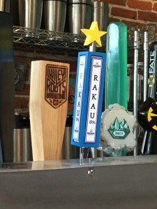 The Confluence Tap Handle, featured above with the blue handle and yellow star, was at the Denver Bicycle Cafe last month serving pints of Mockery Brewing's Rakau IPA and raising $1 for Trips for Kids for every pint sold.