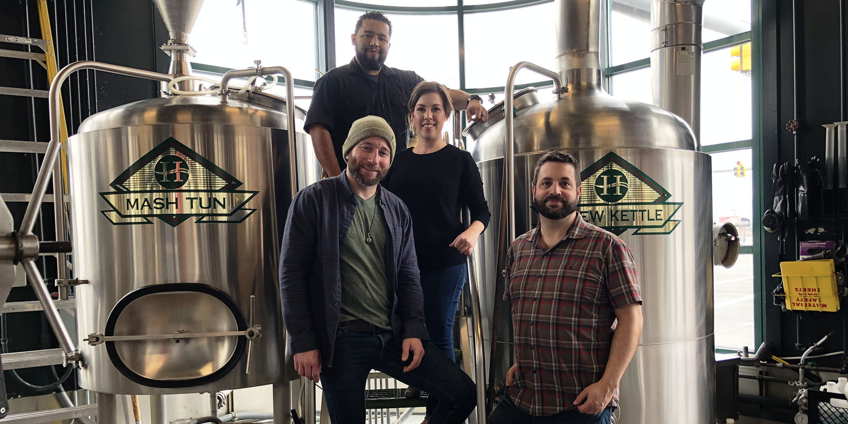From left, Brock Blonquist, general manager; Richard Rodriguez, brewer; Natalie Rogers, marketing director; and Donovan Steele, head brewer.