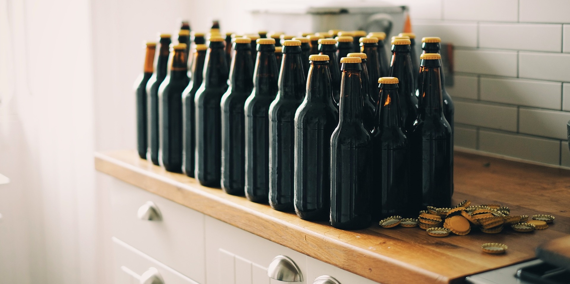 Homebrew bottles in kitchen
