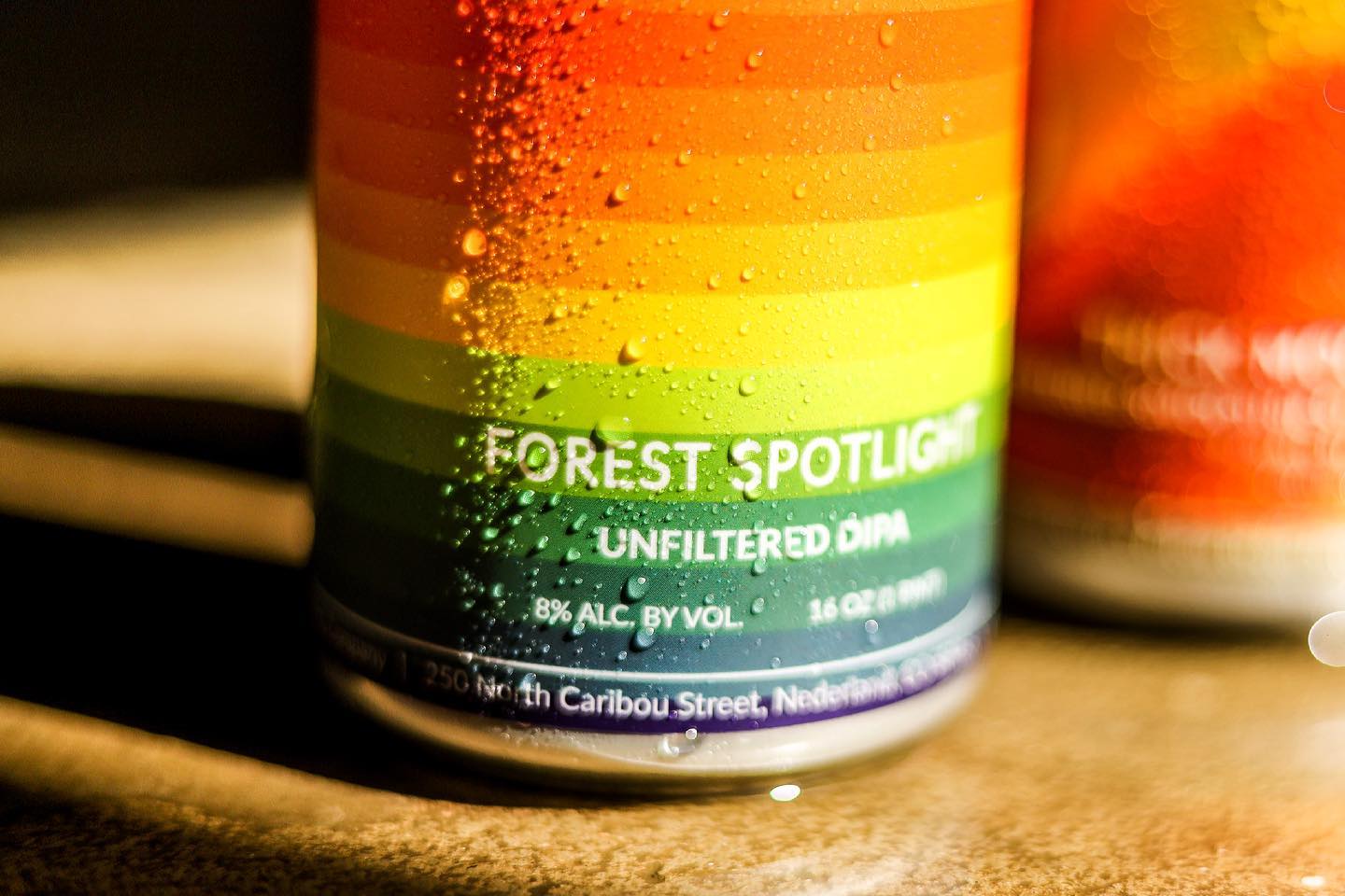 Knotted Root Forest Spotlight can graphic